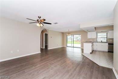 Discover this charming 3-bedroom, 2-bathroom home offering 1,420 - photo 2