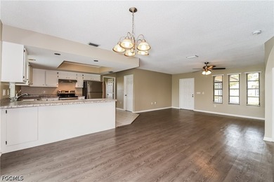 Discover this charming 3-bedroom, 2-bathroom home offering 1,420 - photo 3