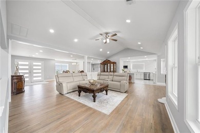 Few homes capture the essence of luxury lake living quite like - photo 13