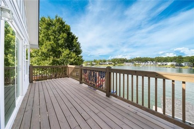 Few homes capture the essence of luxury lake living quite like - photo 16