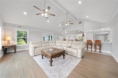 Few homes capture the essence of luxury lake living quite like - photo 17
