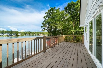 Few homes capture the essence of luxury lake living quite like - photo 34