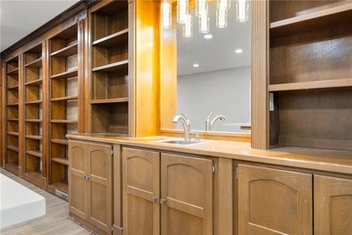 Few homes capture the essence of luxury lake living quite like - photo 49