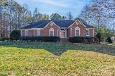 Welcome to this spacious, custom all-brick ranch home in