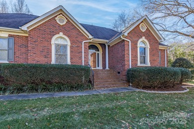 Welcome to this spacious, custom all-brick ranch home in