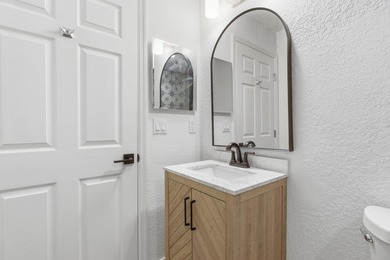 Completely renovated and full of charm, this beautiful 3-bedroom - photo 15