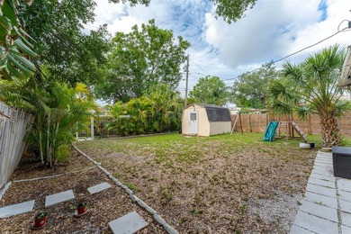 Huge yard with alley access in a hot location! This 3 bed 2 bath - photo 18