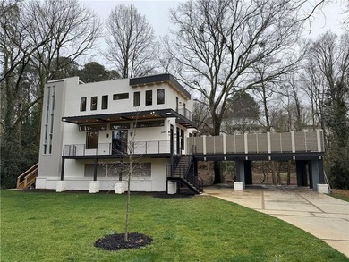 Exceptional modern residence in the heart of Buckhead, offering - photo 3