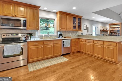 This custom-built full-time lake residence on Jackson Lake is an - photo 28