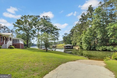This custom-built full-time lake residence on Jackson Lake is an - photo 56