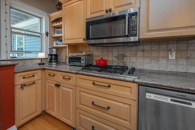 Charming bungalow with character and updates located in the - photo 14