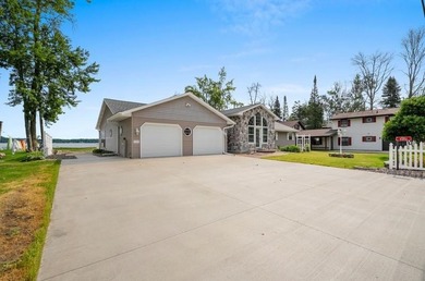 Beautiful arched-window entry welcomes you to this inviting lake - photo 4