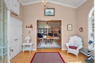 Beautiful arched-window entry welcomes you to this inviting lake - photo 8