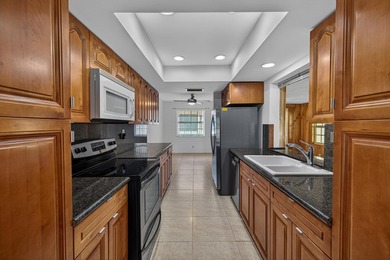 A fantastic location in a well-manicured community. This large 2 - photo 19