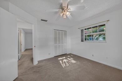 A fantastic location in a well-manicured community. This large 2 - photo 35