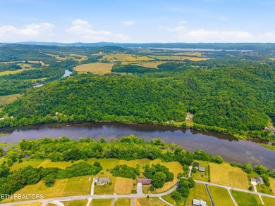 Escape to the serenity of the Holston River with this stunning - photo 3