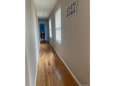 Modern Luxury Meets Coastal Charm in Poquott Village Welcome - photo 9