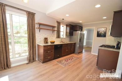 Improved pricing! Welcome to this 1.5-story home offering both - photo 11