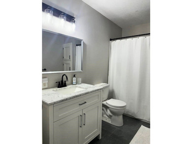 *** PRICED TO SELL QUICKLY*** Beautifully remodeled and truly - photo 8