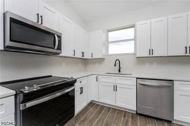 This beautiful 4-bedroom, 3-bathroom, 2,100 sq ft single-family - photo 3