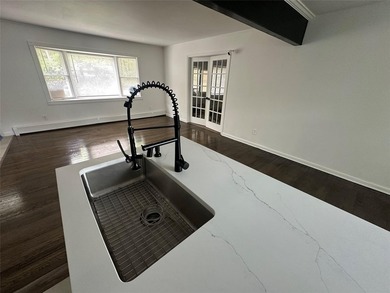 ISLIP School District. This split-level Newly Renovated Home has - photo 11