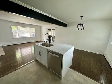 ISLIP School District. This split-level Newly Renovated Home has - photo 12