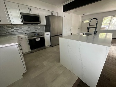 ISLIP School District. This split-level Newly Renovated Home has - photo 14
