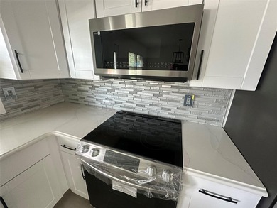 ISLIP School District. This split-level Newly Renovated Home has - photo 15