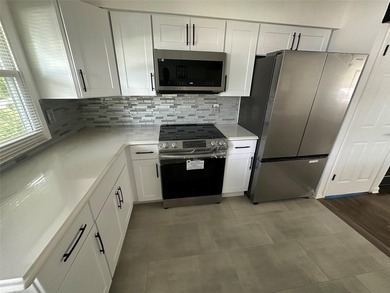 ISLIP School District. This split-level Newly Renovated Home has - photo 16