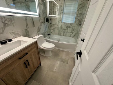 ISLIP School District. This split-level Newly Renovated Home has - photo 21