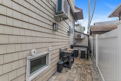 Experience the best of coastal living at 125 Taft Avenue, a - photo 24