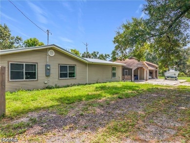Nestled on just over an acre in North Fort Myers, this charming - photo 3