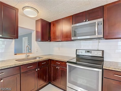 Nestled on just over an acre in North Fort Myers, this charming - photo 8