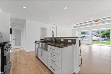 Welcome to this Amazing Fully Updated Custom Waterfront Ranch in - photo 22