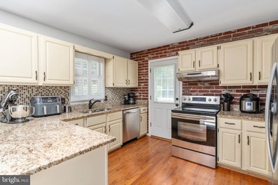 Welcome home to this charming 3-bedroom, 2-bath rambler situated - photo 22