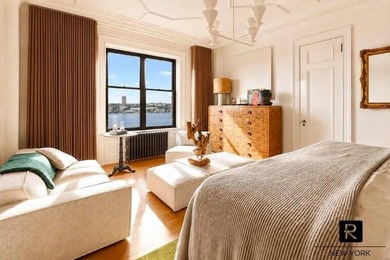 Perched high above Riverside Park, Residence 9F is a masterfully - photo 5