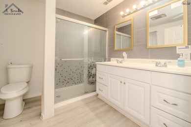 This spacious 4-bedroom, 2-bathroom home offers a warm and - photo 11