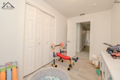 This spacious 4-bedroom, 2-bathroom home offers a warm and - photo 16