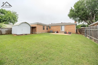 This spacious 4-bedroom, 2-bathroom home offers a warm and - photo 20