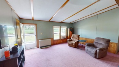 Welcome to this 4-bedroom, 2-bath home nestled on 1.27 acres