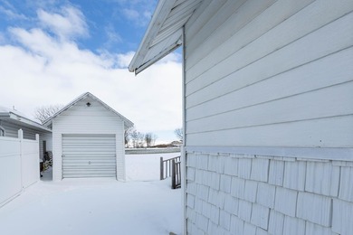 This charming craftsman~style 1949 bungalow is open concept, one