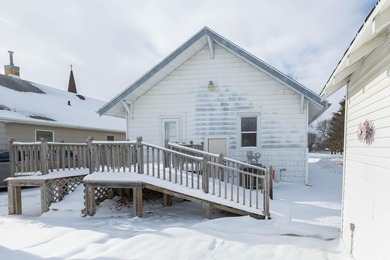 This charming craftsman~style 1949 bungalow is open concept, one