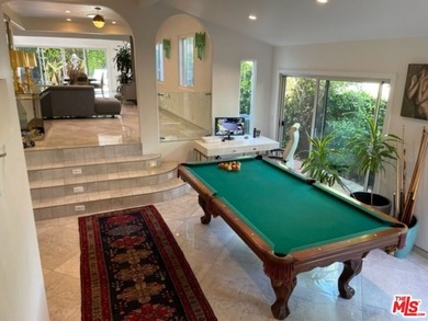 Welcome to a captivating coastal Mediterranean-style retreat in - photo 13