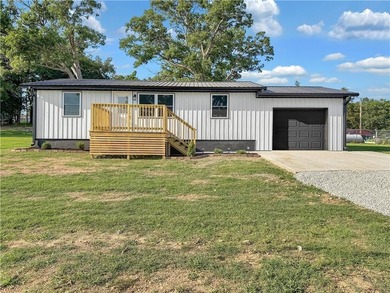 Completely remodeled and move-in ready, this 3-bedroom, 1-bath - photo 1