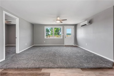 Completely remodeled and move-in ready, this 3-bedroom, 1-bath - photo 2