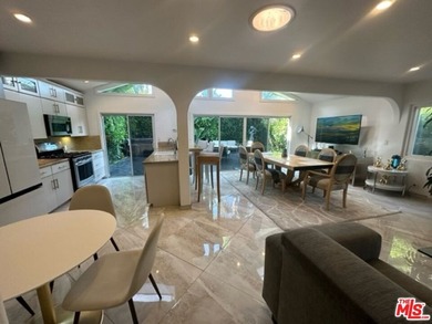 Welcome to a captivating coastal Mediterranean-style retreat in - photo 36