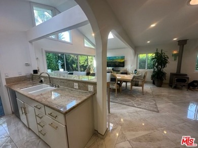 Welcome to a captivating coastal Mediterranean-style retreat in - photo 37