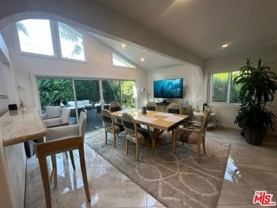 Welcome to a captivating coastal Mediterranean-style retreat in - photo 38