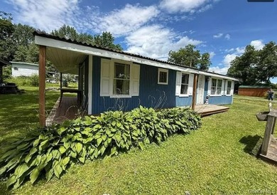 Rare Opportunity! Fully Furnished Seasonal Lake Cottage with - photo 10