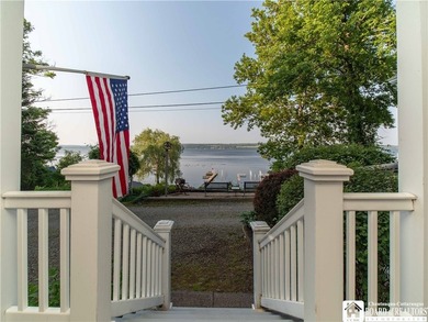 Welcome to 4896 Ashville Bay Road, a rare lakefront retreat on - photo 1